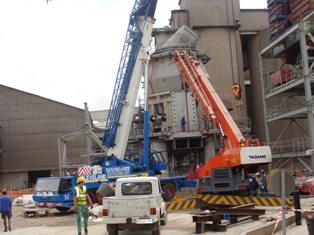Industrial plant construction with crane operations